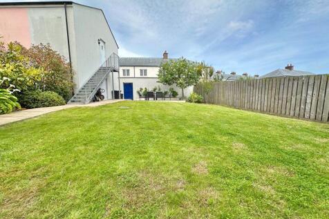 Enclosed rear garden. Steps to worksh...