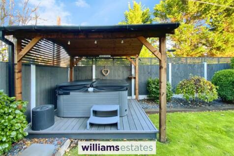 decked patio with gazebo