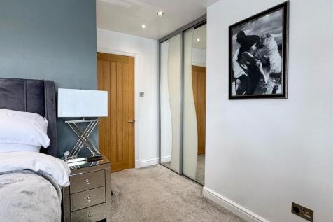 Bedroom One With Built-In Wardrobes