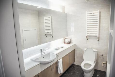 modern-clean-bathroom-with-toilet-and-sink-2024-10
