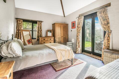 bedroom with patio doors