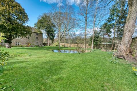 Garden - swing seat and pond towards house.jpg