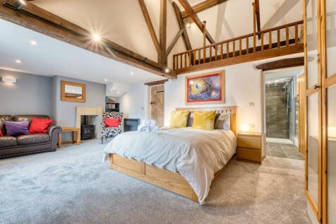 Manor Cottage Bedroom One towards mezzanine.jpg