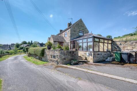 Front of the home - conservatory and parking.jpg