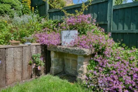 Rear Garden - stone bench.jpg