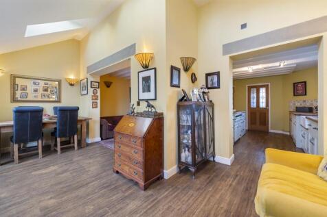 Dining area towards Kitchen and Sitting Room.jpg