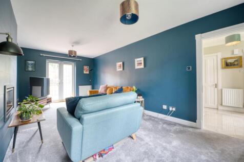 Sitting Room towards garden and hallway.jpg