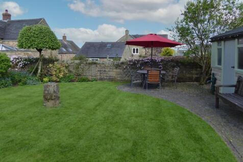 Rear Garden - lawn and outdoor dining.jpg