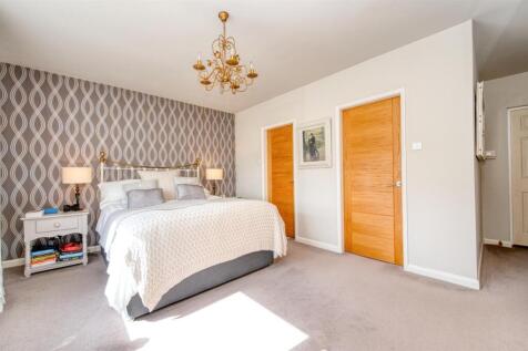 Bedroom One towards en-suite and walk-in wardrobe.