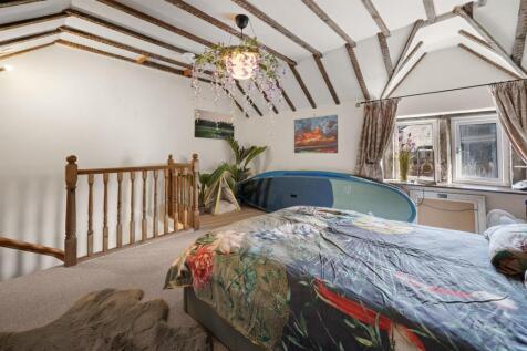 Bedroom Three to stairs.jpg