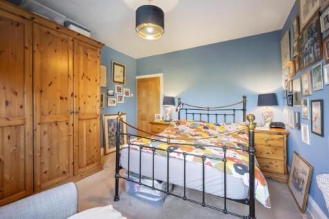 Bedroom One - bed and wardrobes.jpg