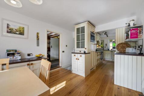Breakfast Room towards kitchen and dining room.jpg