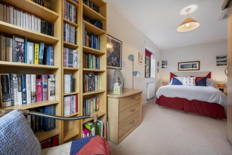 Bedroom Three - seating and bed.jpg