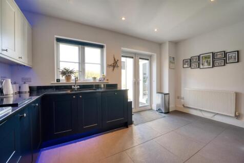 Kitchen towards sink and garden.jpg