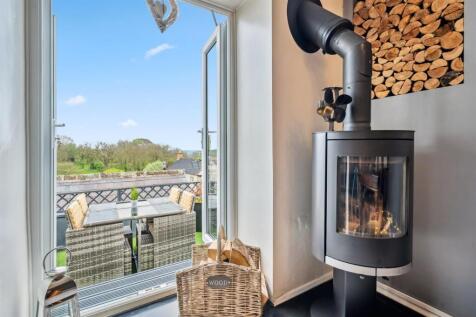 Log burner and terrace.jpg
