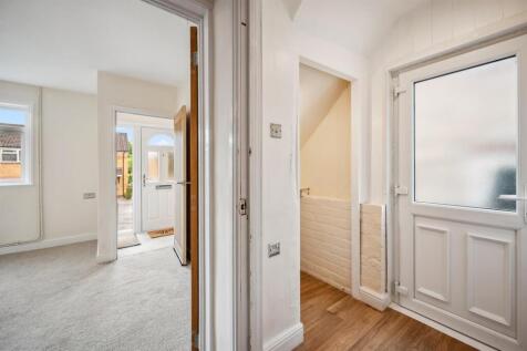 Rear Porch - and through Lounge to front door.jpg