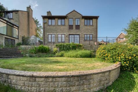 Rear of the home and crescent lawn.jpg