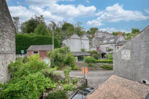 Bedroom One - view to village rooftops behind.jpg
