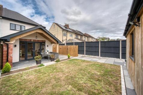Rear of the home and lawn.jpg