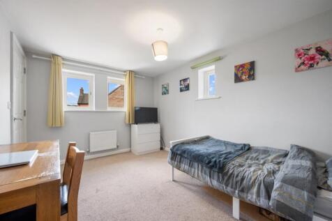 Bedroom Two to windows.jpg
