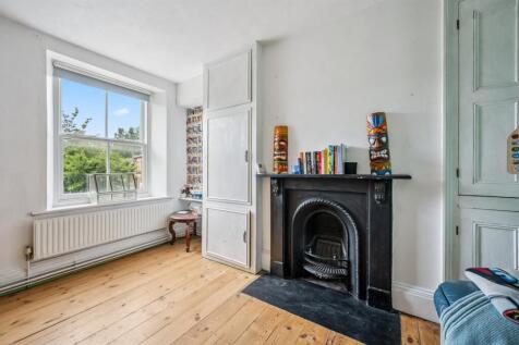 Bedroom One - fireplace and window.jpg