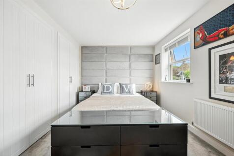 Bedroom One - bed and wardrobes.jpg