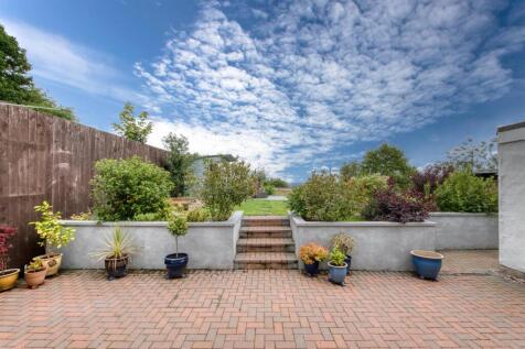 Rear Garden - patio dining to lawn.jpg