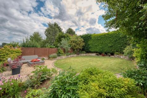 Rear Garden - lawn and seating area.jpg