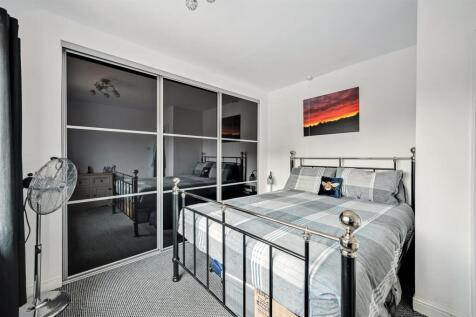 Bedroom Two to wardrobes.jpg