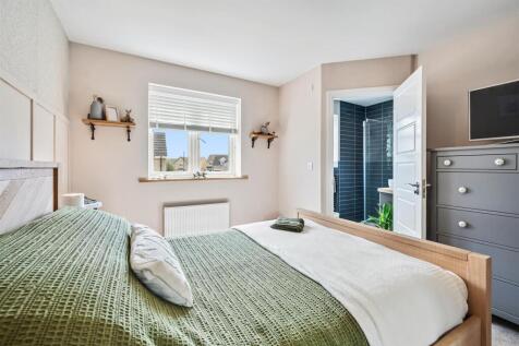 Bedroom Four to en-suite and window.jpg