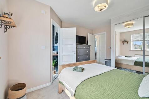 Bedroom Four to en-suite and landing.jpg