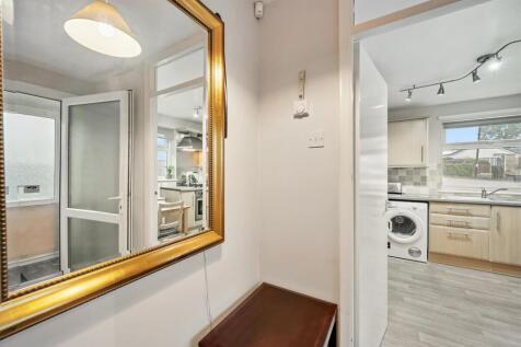 Kitchen and lobby through mirror.jpg