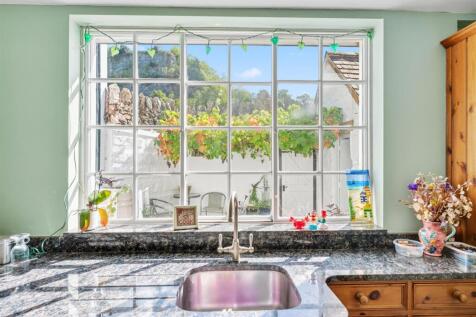 Kitchen window to courtyard garden.jpg