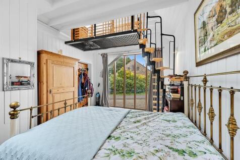 Bedroom to window and mezzanine.jpg