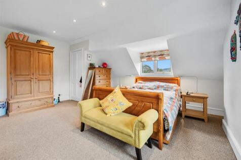 Bedroom One - bed and wardrobe.jpg