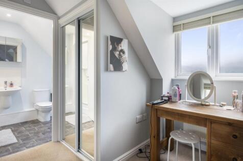 Bedroom Three - dressing area to en-suite.jpg