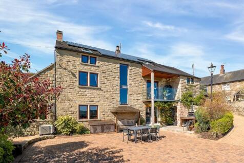 Dining patio and rear of the home.jpg