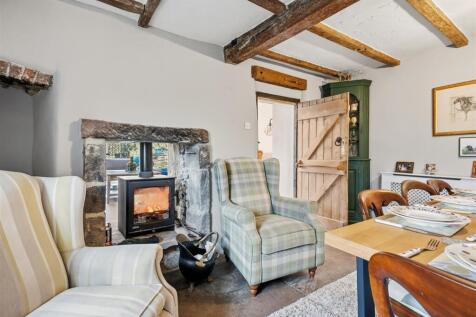 Dining Room - seating and fireplace.jpg