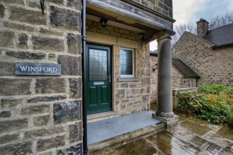 House sign and colonnade.jpg