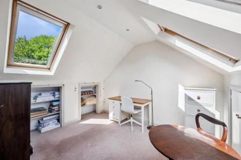 Bedroom Three to eaves shelving.jpg