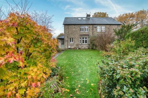 Rear of the home and lawn.jpg