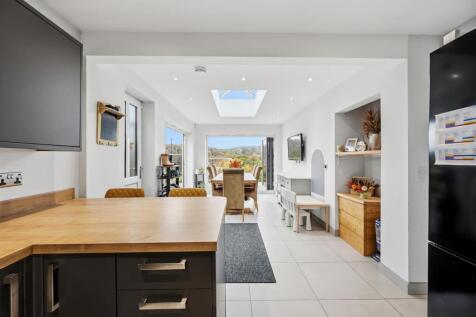 Breakfast bar to dining area and view.jpg