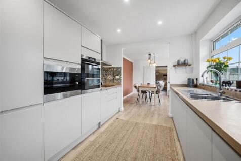 Kitchen to dining room and lounge.jpg