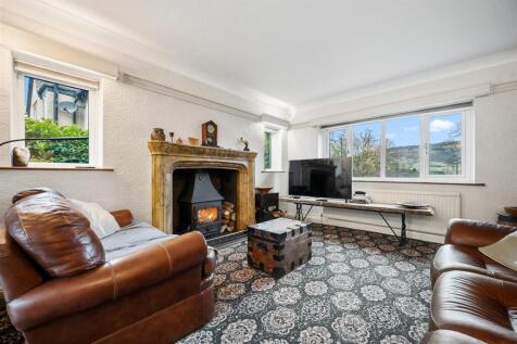 Sitting Room to front window.jpg