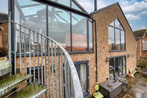 Rear of the home from spiral staircase.jpg