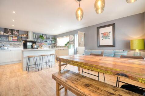 Dining table towards kitchen.jpg
