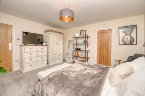 Bedroom One towards landing and en-suite.jpg