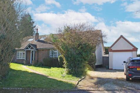 FRONT WITH GARAGE.JPG