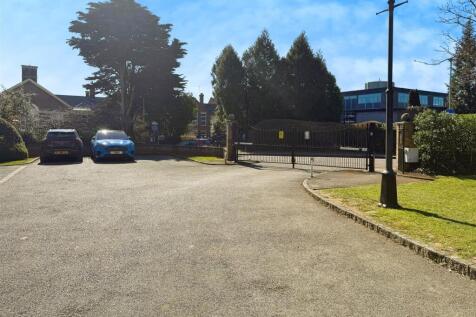 FRONT GATED AREA WITH VISITOR  PARKING