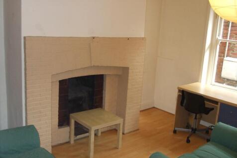 view of lounge with desk including double bed seat